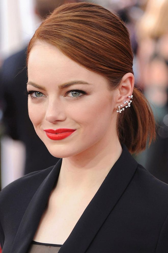 Looking for a polished alternative? Make like Emma Stone and pull your locks into a ponytail with a deep side part.