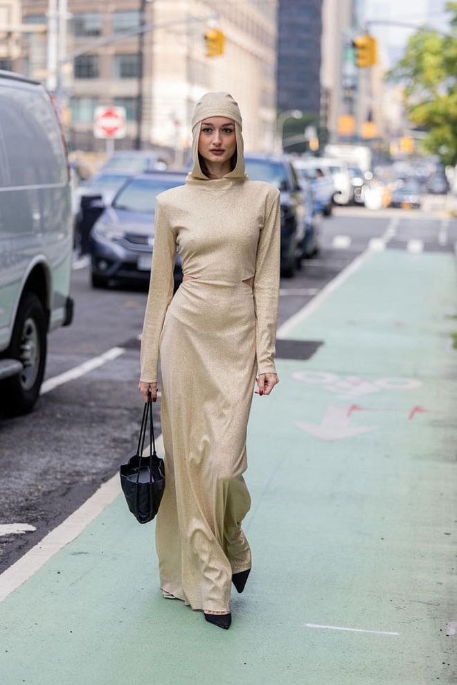 NEW YORK, NEW YORK - SEPTEMBER 09: A guest wears head piece with dress in beige outside Bevza on September 09, 2023 in New York City. (Photo by Christian Vierig/Getty Images)