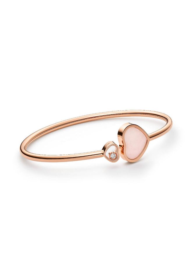 Ethical rose gold, diamond and pink﻿ opal Happy Hearts bangle $6,890, Chopard