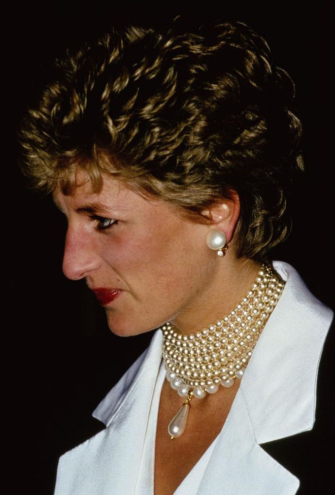 This combination piece—a mashup of one of Diana's beloved eight-strand chokers and a pearl-drop necklace that the Princess assembled herself—captures both Diana's timeless elegance and her willingness to take a risk; a fitting choice for Harry's bold bride-to-be.
Photo: Getty 