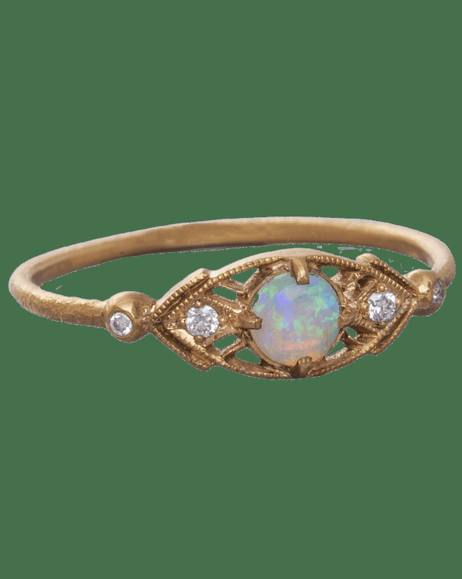 14kt gold ring with opal and white diamond, $585, loveadorned.com.
