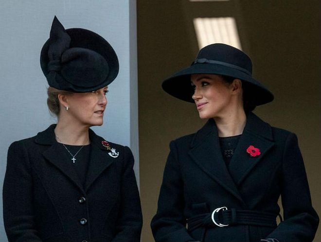 Prince Edward's wife, Sophie, talks with Meghan Markle.

Photo: Getty