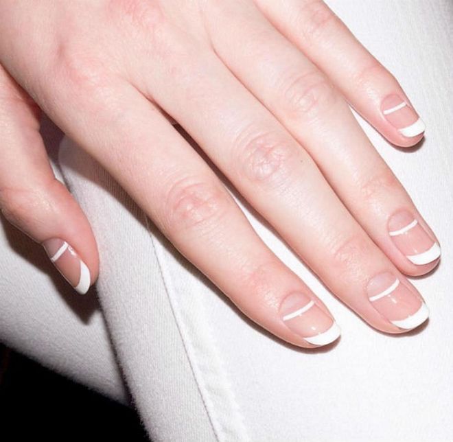 Modernize a French with the addition of a thin stripe worn one-third of the way down the nail. Soft rounded edges are key. 
@aliciatnails