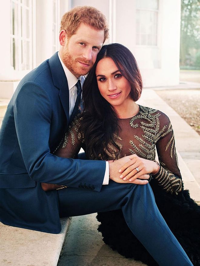 Prince Harry and Meghan Markle pose for their romantic official engagement photos, shot by Alexi Lubomirski at Frogmore House, Windsor. The pictures were released in December 2017, just a month after the couple announced their engagement. Markle flaunts her ring, which includes a center diamond from Botswana and two smaller ones from Princess Diana's personal collection.