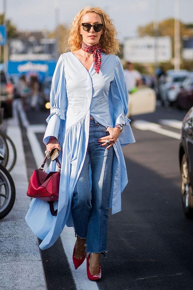 Pair a tailored, button-up frock with jeans for a chic contrast. The classic style of the dress will perfectly offset the denim and make for a seriously effortless look. Photo: Getty