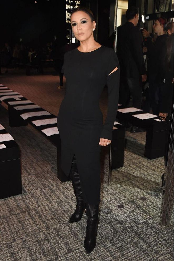 Eva Longoria sat front row in a simple black dress and pointed boots.

Photo: Getty