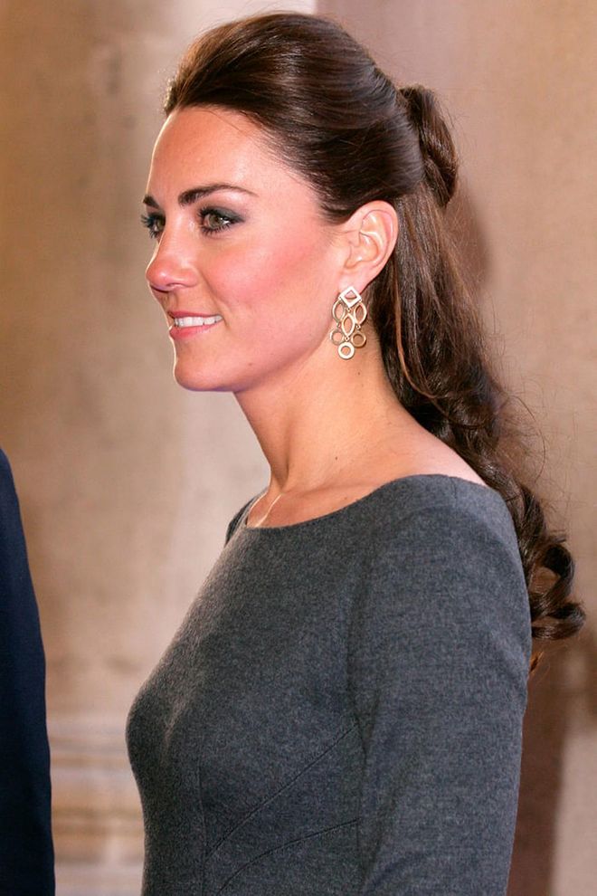 Extra shine and bouffant-level volume add an easy elegance to the Duchess of Cambridge's half bun. Photo: Getty