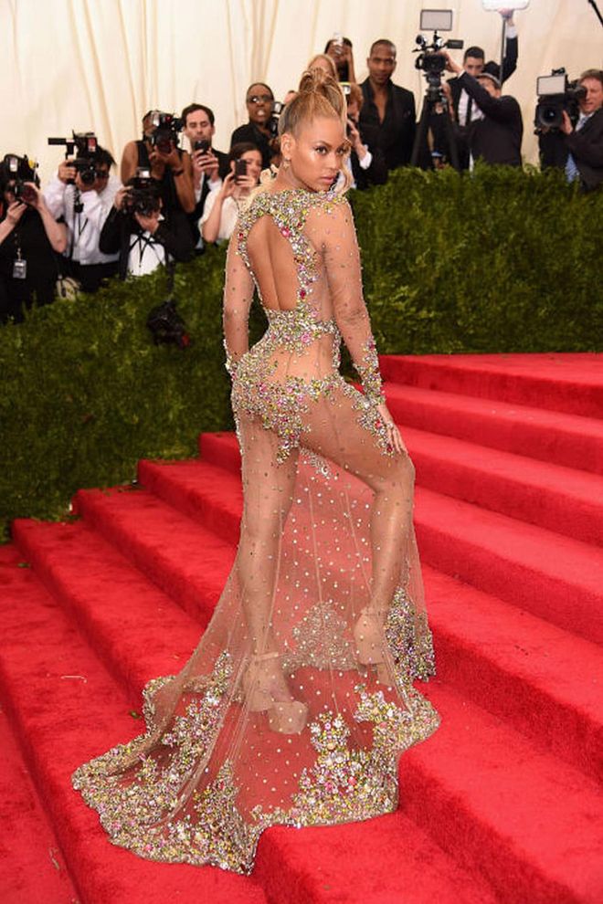 Beyoncé slayed the red carpet in an artfully placed naked Givenchy dress at the 2015 Met Gala, where many celebs seemed to take the theme 'Through The Looking Glass' quite literally. Photo: Getty