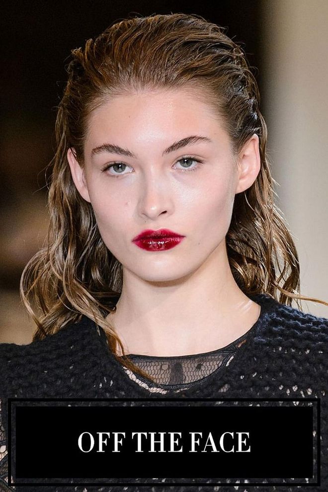 Slicked-back hair was one of the biggest hair trends for spring 2017. For fall, the trend loosened up a little. Sure, there were still a few slick looks, like the sporty, gym-chic hair at Giambattista Valli. But at so many other shows like Michael Kors, Brandon Maxwell, and Thakoon, the hair was simply brushed back or tucked behind the ears. Basically, as long as there's no hair hanging in your face—you're now on trend.