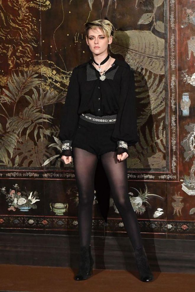Kristen Stewart stayed true to signature grungy look at the Chanel show.

Photo: Getty