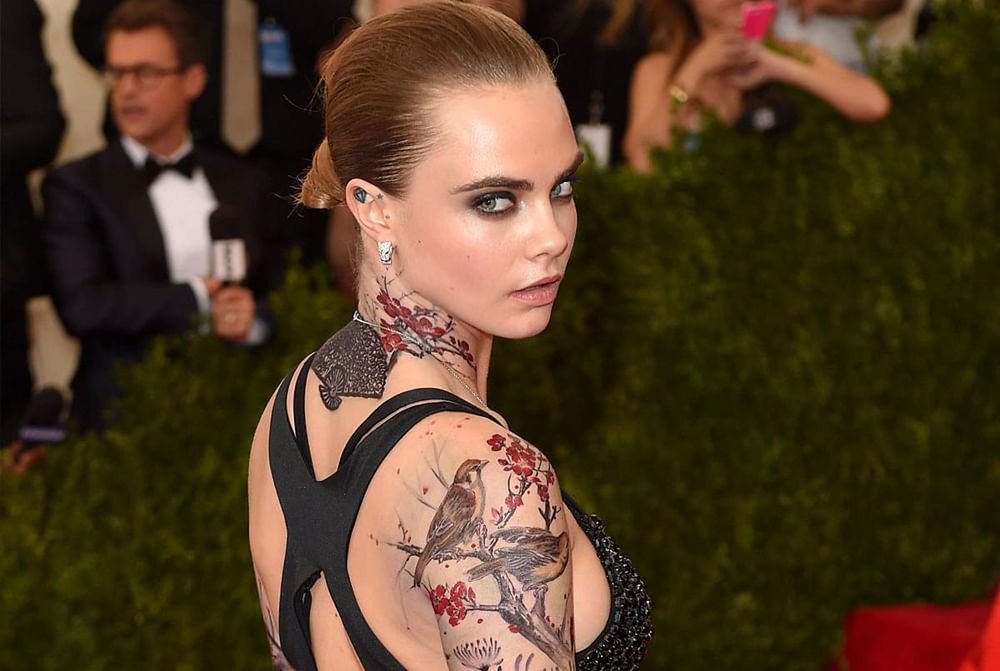 Cara Delevingne's Tattooed Sleeves At The MET Gala - Harper's Bazaar ...