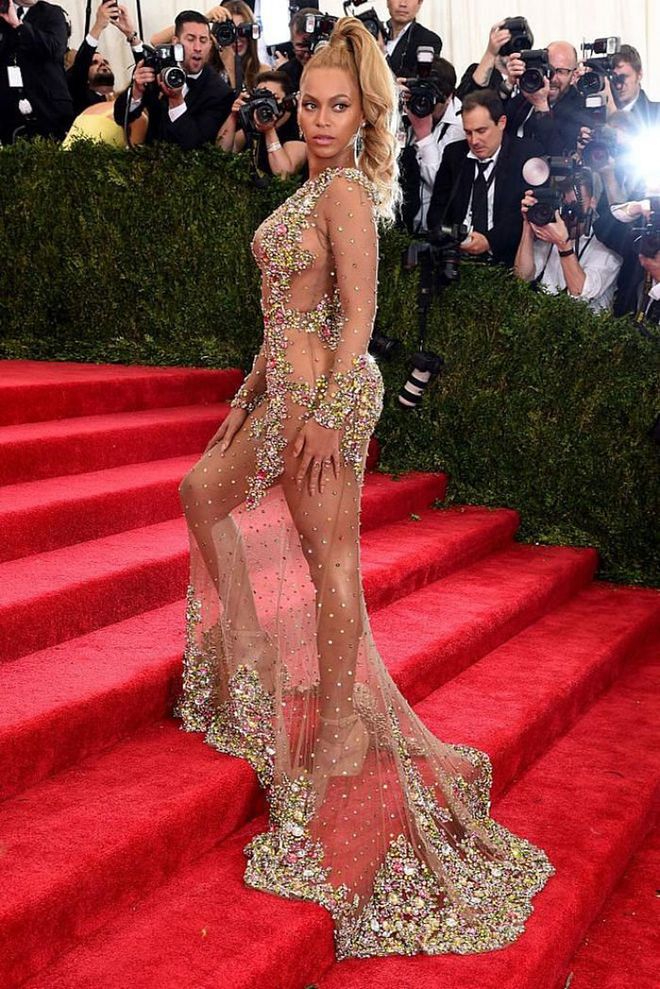 Beyoncé might have arrived late to the 2015 Met Gala, but it was worth the wait. The singer bought back the naked dress, wearing an entirely sheer Givenchy gown with strategically placed jewels. It was a look that instantly went down in Met Gala history.

Photo: Getty