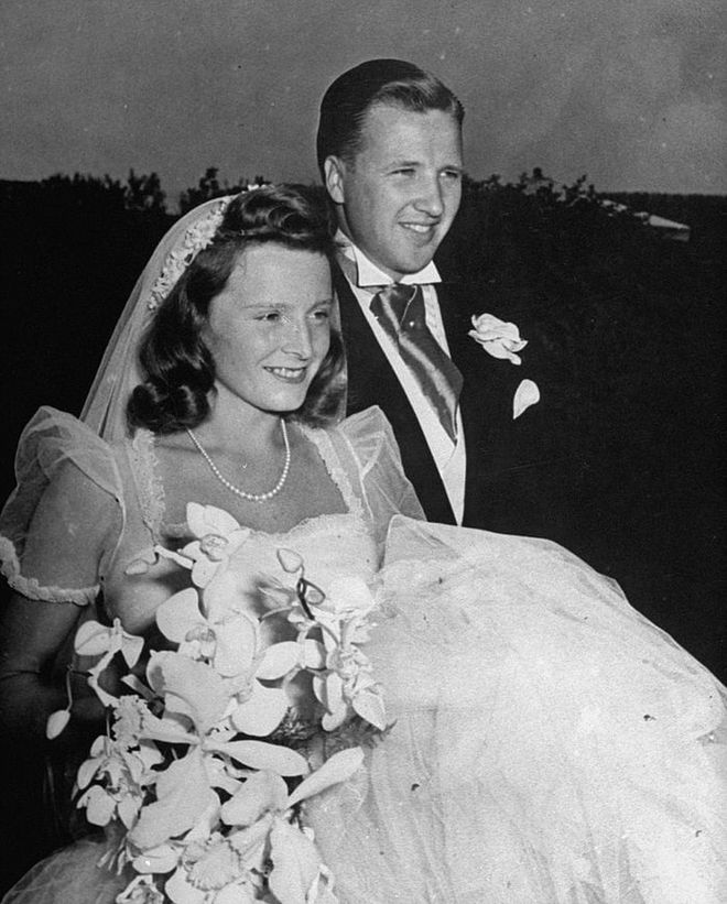 This 1940 wedding was a HUGE deal—in fact, a hilariously old-time-y video about it can be found on YouTube.

Henry Ford II and Anne McDonnell were married in Long Island, and the church was swarming with hundreds of uninvited guests hoping for a glimpse of the bride and groom. Anne's dress is ever-so lovely, with sheer cap sleeves and a giant skirt. Photo: Getty 