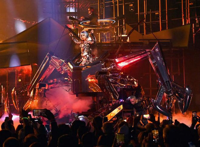 Riding in on a giant mechanical spider, Lady Gaga changed outfits yet again.