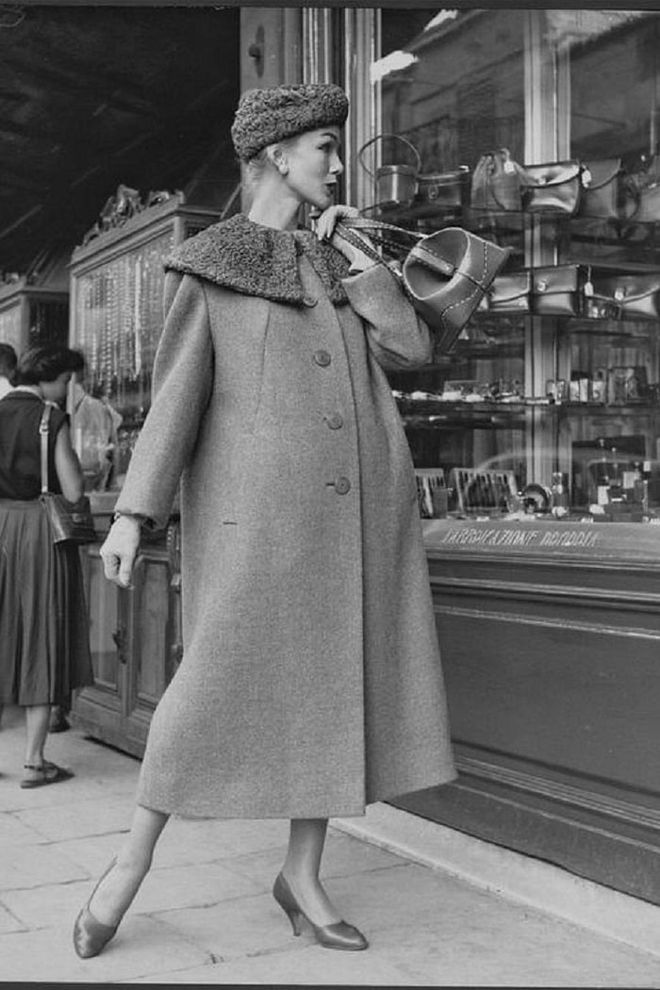 A model wearing a coat with fur collar and hat.

Photo: Getty