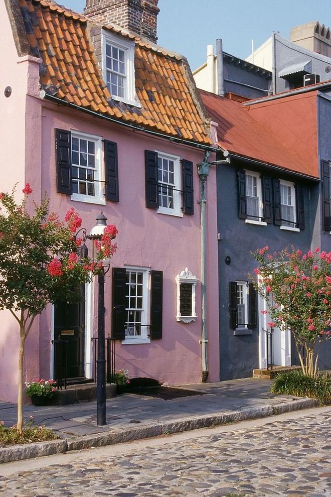 In 1931, an affluent judge and his wife bought a section of houses in this historic city and painted them pastel. Their neighbors followed suit, leading to a street dubbed "Rainbow Row" and many other colorful moments sprinkled throughout the historic city.
