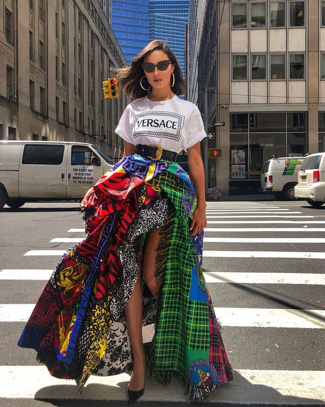 Strutting around the streets of NYC for a shoot in a eye catching summer piece by Versace. Photo: Instagram/@oliviaculpo