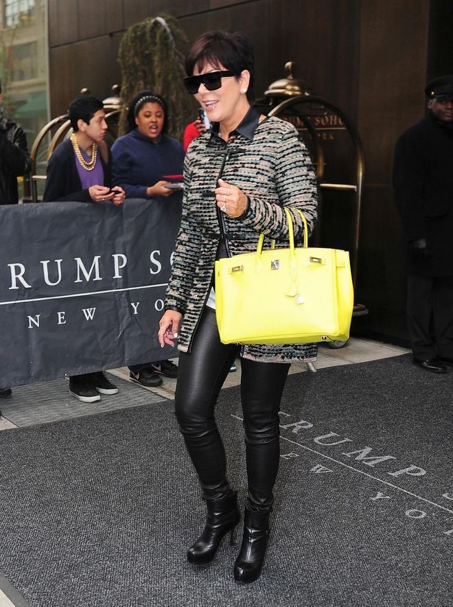 Prior to being seen with boy toy Corey Gamble, Kris Jenner was never seen anywhere without a highlighter yellow Birkin. 
Photo: Getty