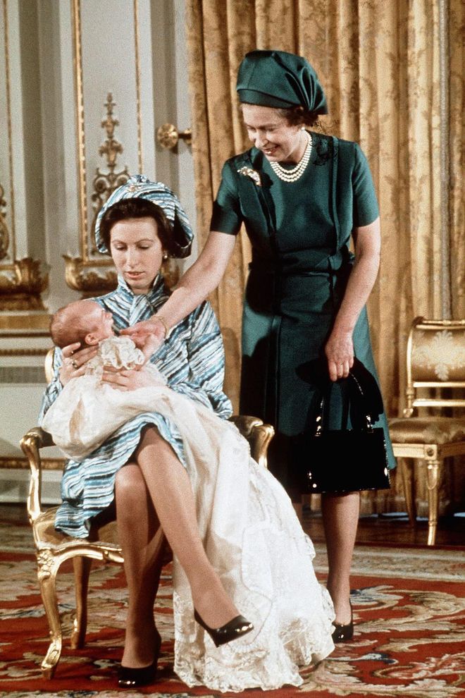 Queen Elizabeth with her daughter Princess Anne and her first grandchild, Peter Phillips. Photo: Getty
