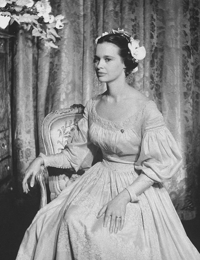 Gloria Vanderbilt's third husband was director Sidney Lumet. They married in 1956 and divorced in 1963, so the relationship was admittedly pretty short-lived.

Even so, Gloria looked absolutely stunning on her wedding day, wearing a beige gown rather than the traditional white, which was made out of French linen that dates from 1830. Note: She ditched the pearls. Photo: Getty 