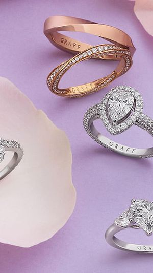 GRAFF SPIRAL COLLECTION: Rose gold ring; rose gold and pavé diamond ring, from $3,000. White gold and 1.01-carat pear-shaped diamond Constellation ring; white gold and 1.11-carat round diamond Icon ring; white gold and 2.01-carat heart-shaped diamond Promise ring. (Photo: Ching)