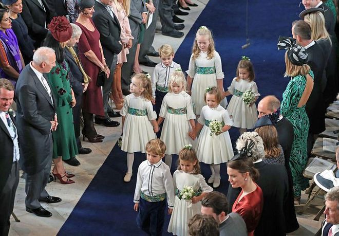 There was a group of eight pageboys and bridesmaids in the bridal party, including Princess Charlotte and Prince George.

