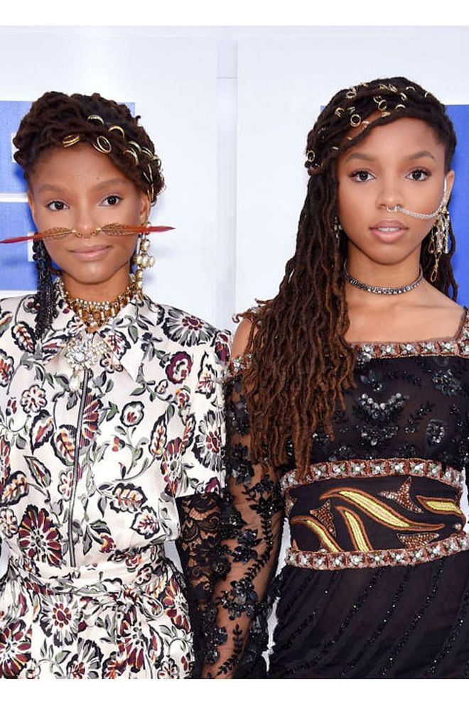Schooling us all in the art of hair piercing, Beyoncé's proteges adorned a slew of gold hoops in their dreadlocks. 