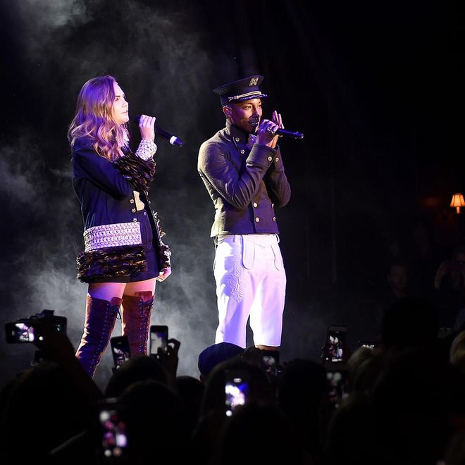 Cara Delevingne performing with Pharrell Williams