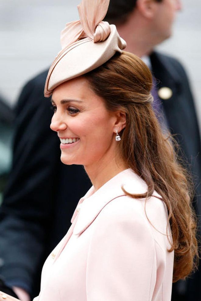 Because we can't have her title/husband/wardrobe/tiaras, we might as well try and steal her style tricks. The Duchess keeps it classy, as always, with a dainty hat. Photo: Getty