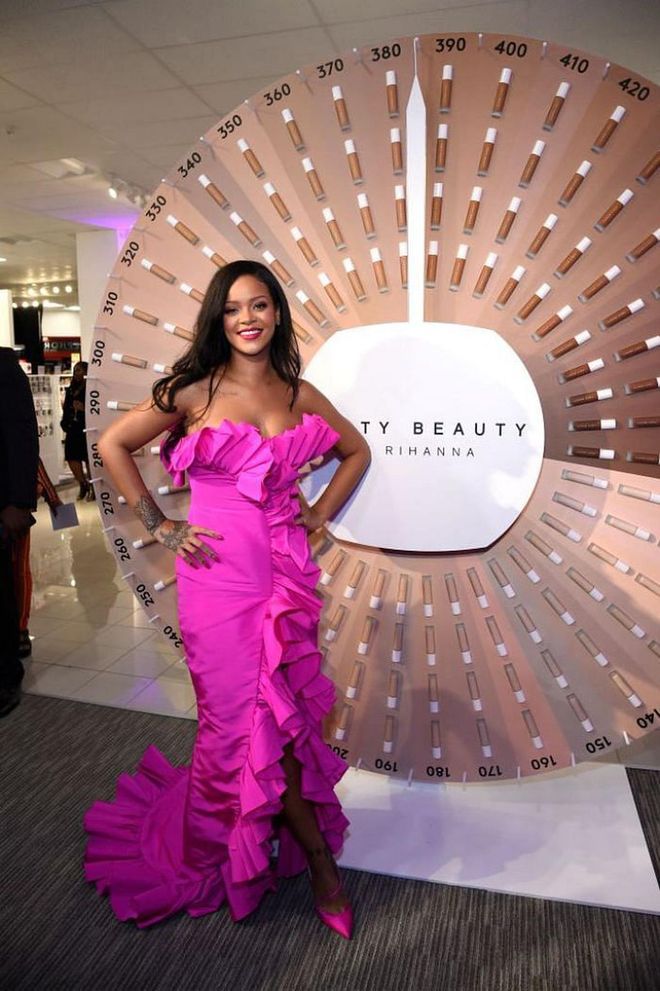 Rihanna is a fuschia dream wearing a Calvin Klein strapless gown with ruffles for an event at Sephora in Brooklyn, New York.

Photo: Getty Images