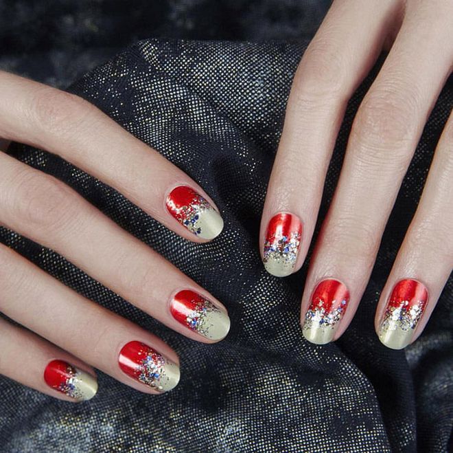 A ruby, gold, and glitter-topped manicure that somehow doesn't feel overdone. @jinsoonchoi