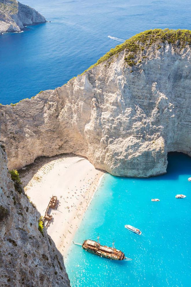 Located in a remote cove on Zakynthos in Greece's Ionian Islands, Navagio Beach gets its nickname—Shipwreck Beach—because of the ship that ran aground here in the 1980's.
