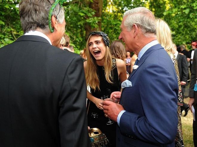 Being spawn from aristocratic stock means Cara can guffaw as wide-mouthed and haughtily as she likes. (Plus, Camilla probably just shared a cracking gag.)