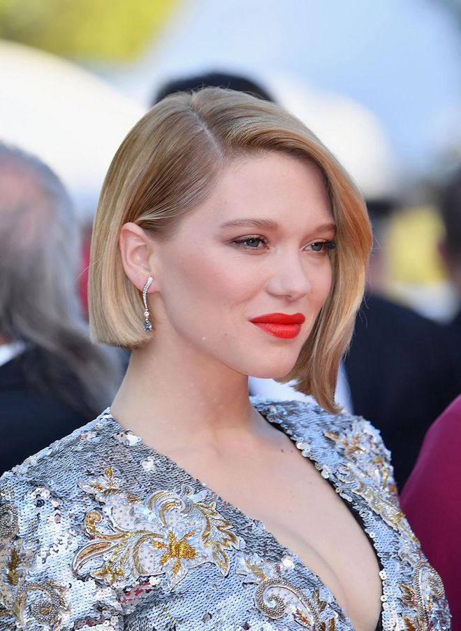 If red lipstick is your signature, we love how Léa Seydoux paired an electric orange-red shade with little other visible makeup, save for a touch of blush, natural eyeshadow, and mascara.
Photo: Getty