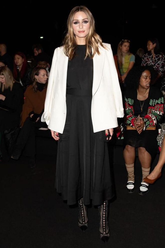 Olivia Palermo looked chic in a black dress and white blazer combination.

Photo: Jacopo Raule / Getty