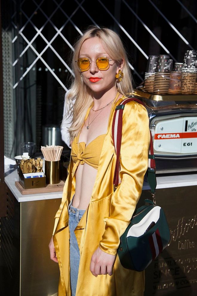 Musician Asta wearing all Hansen and Gretel, vintage sunglasses, Bally bag and Gucci shoe. Photo: Getty 