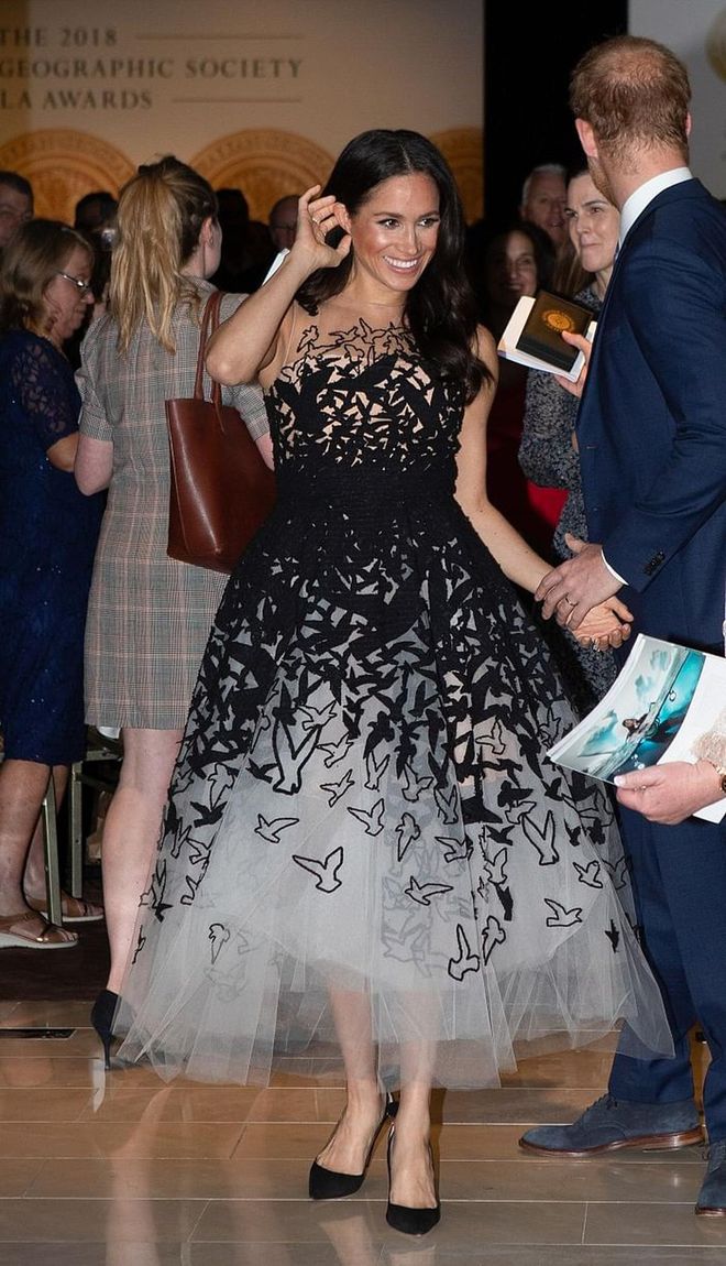 Meghan Markle stunned in an amazing  Oscar de la Renta white tulle gown with laser cut birds for the Australian Geographic Society Awards in Sydney. 