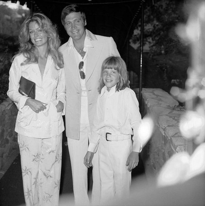 Marrying Lee Majors in 1973. Such great hair on this family. 