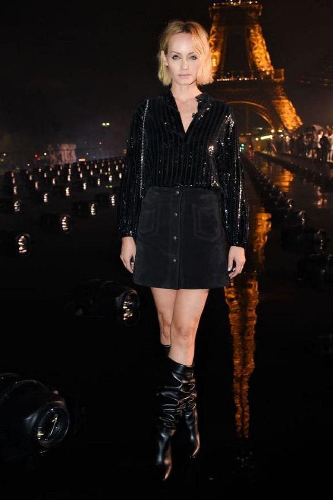 Amber Valletta attended the show in knee-high boots and an A-line mini.

Photo: Getty