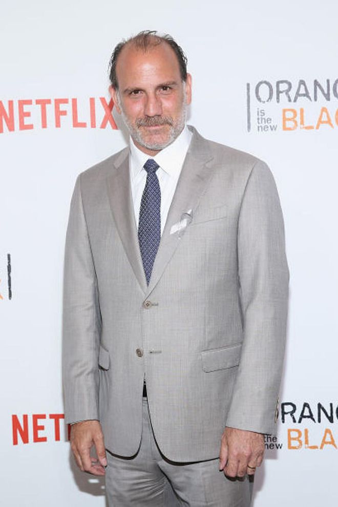 Off-screen, actor Nick Sandow prefers a crisp gray suit and a little extra facial hair.