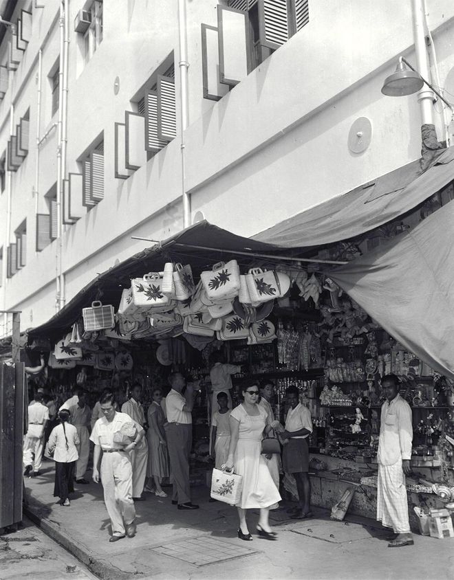 Sidewalk shopping in Orchard Road, 3 July, 1949.