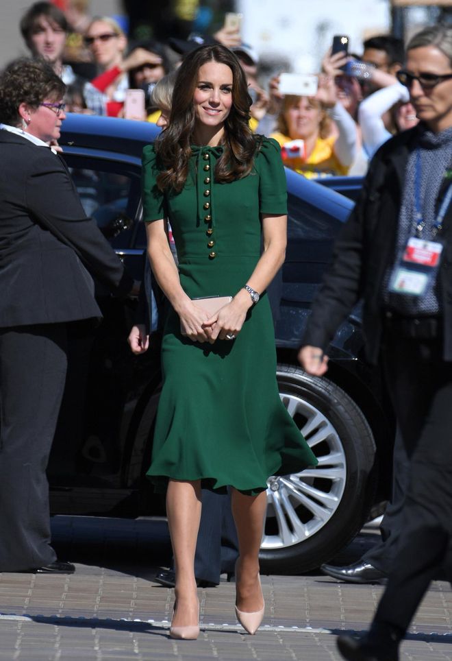 The Duchess of Cambridge wore an elegant moss green dress with a feminine bow on her visit to the University of British Columbia. Photo: Getty