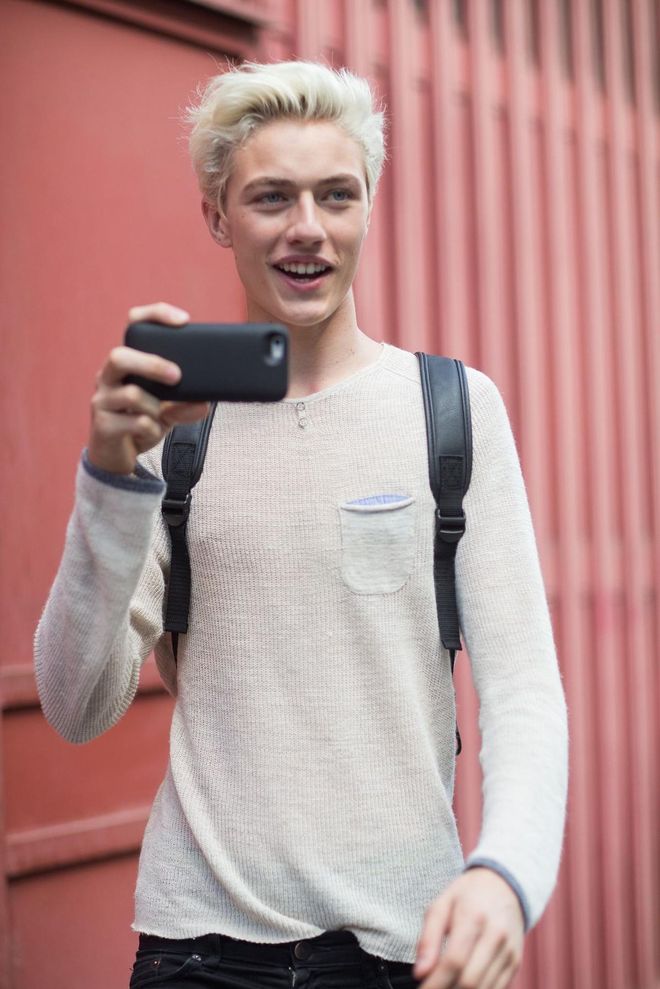 MILAN, ITALY - JUNE 21: Model/Musician Lucky Blue Smith exits the Salvatore Ferragamo show and shoots a video of the photographers on June 21, 2015 in Milan, Italy.  (Photo by Melodie Jeng/Getty Images)