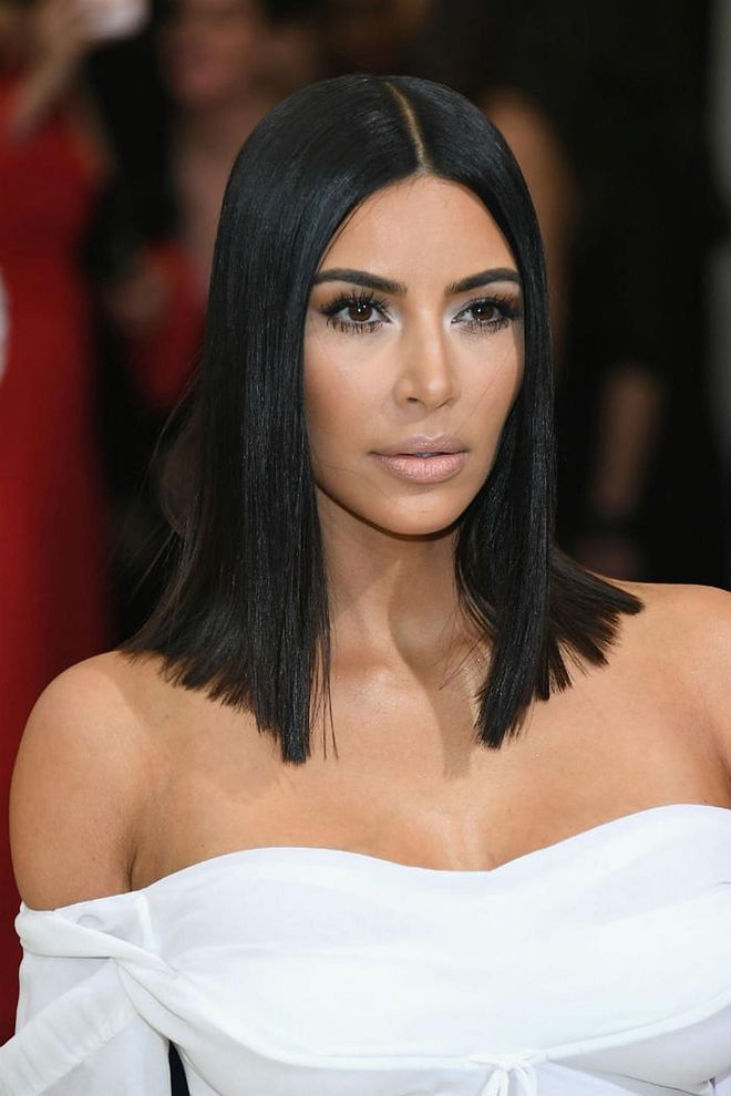 Always on point, Kardashian's look was part au naturel, part glamorous with her sparkling eye makeup and nude lips (Photo: Getty)
