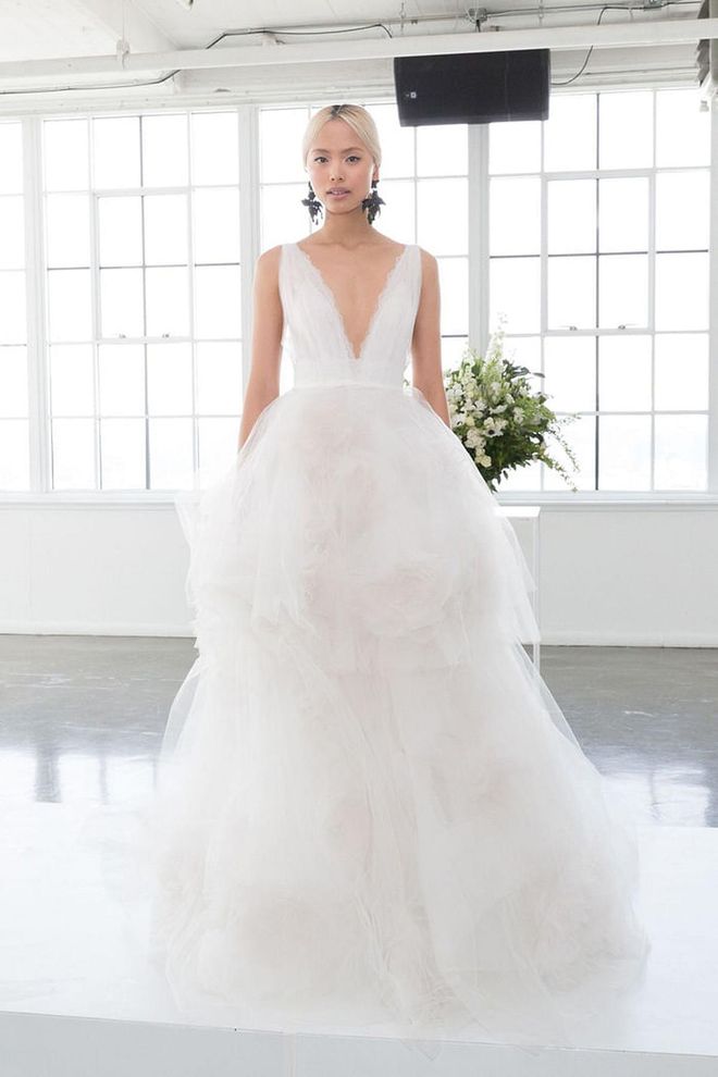 Full skirts are even better for low-key settings when they're plush , soft and tiered. Cloud- like skirts seem made for vast, rolling hills and sprawling ranches, Machesa gown, marchesa.com. 