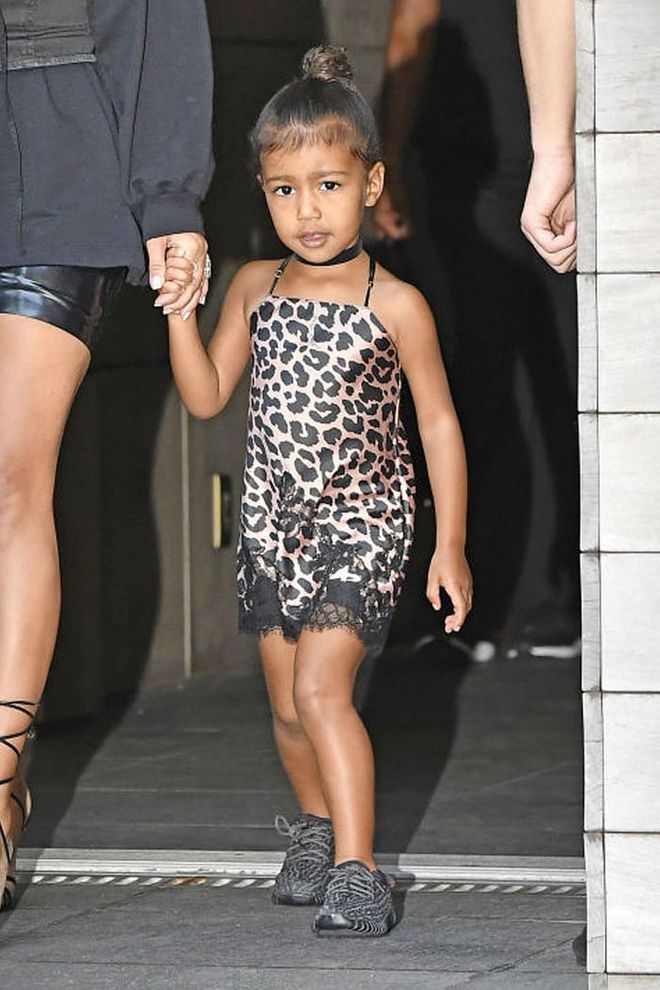 While in New York, North stepped out in a leopard slip dress, black choker and Yeezy Boosts—reminding us all she still dresses better than most adults. 