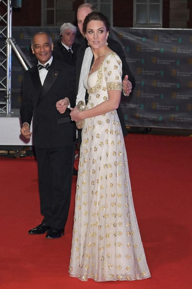 The Duchess of Cambridge was on hand to support husband William on the red carpet (ahead of him presenting an award during the evening). She chose to rewear a white-and-gold Alexander McQueen gown that we first saw her in during the royal tour of Malaysia in 2012.

Photo: David M. Benett / Getty