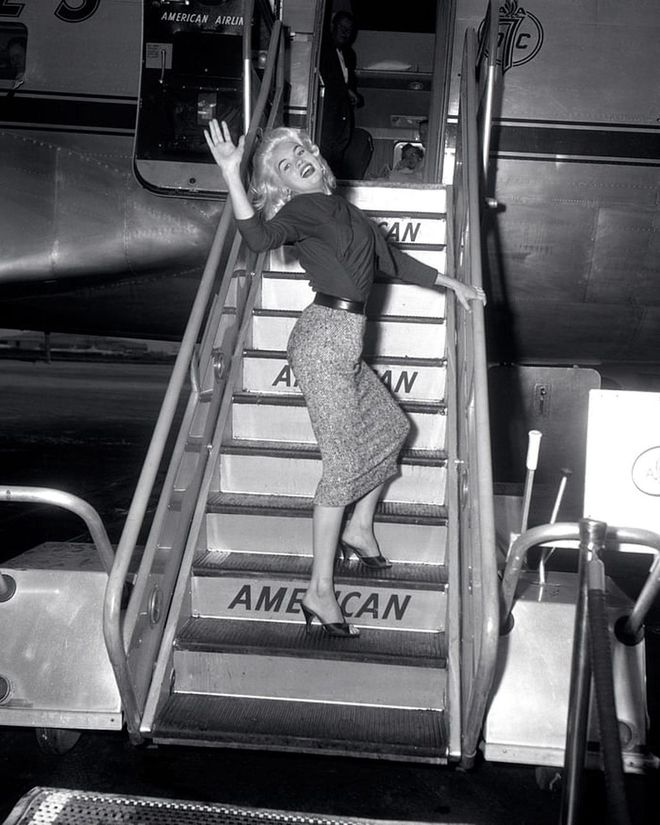 Boarding an American Airlines plane in 1960. 

Photo: Getty 