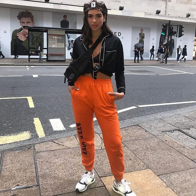 While cruising the London streets, Dua sported this adorable Alexander Wang x Kangol Cap over a black pajama top, MISBHV track pants, Cartier necklace and 
New Balance shoes, Very 90's, as usual. 
Photo: Instagram
