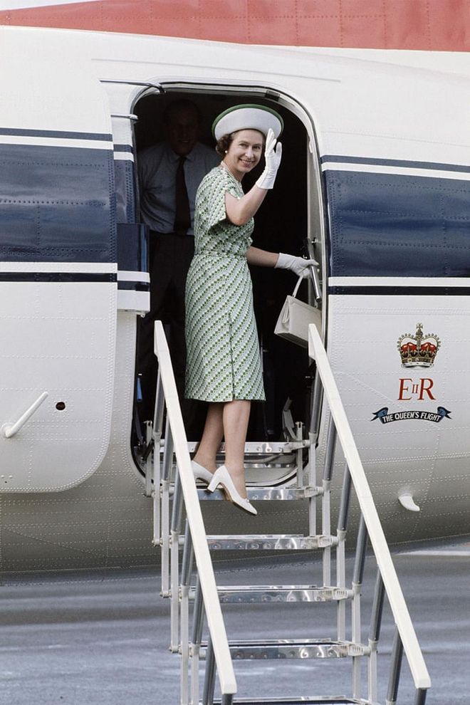 She doesn't have a passport, as all British passports are distributed in her name. Here, the Queen is pictured boarding a plane in Fiji. Photo: Getty 
